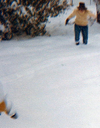 Sandy in deep snow near the yellow '72 Superbeetle